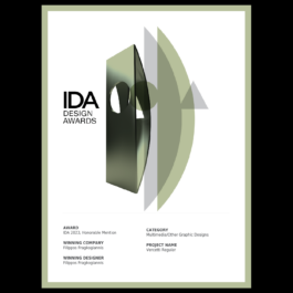 A certificate from the IDA Design Awards 2023, featuring an Honorable Mention. The design includes a modern, abstract 3D sculpture in metallic green tones, positioned alongside the 
