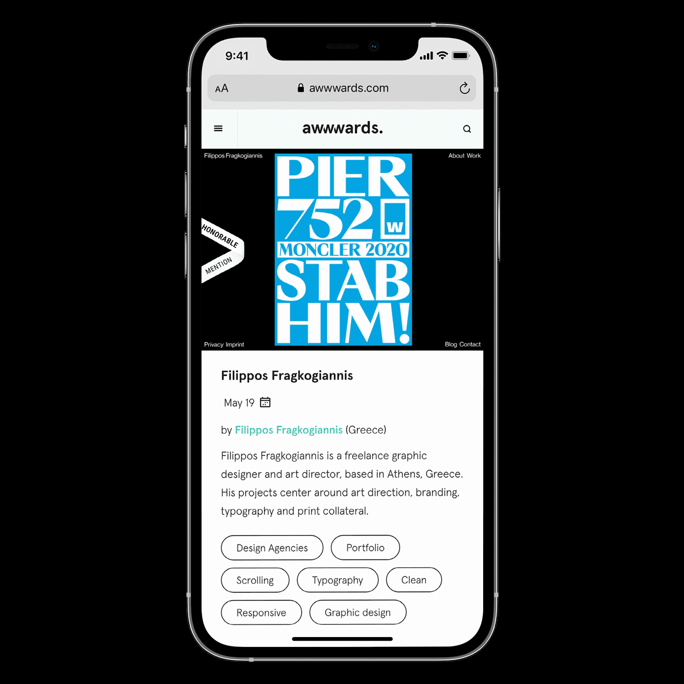 A smartphone screen displaying a project page on the Awwwards website featuring Filippos Fragkogiannis. The screen shows a bold blue and white typographic poster with the text “PIER 752 MONCLER 2020 STAB HIM!” which received an “Honorable Mention.” Below the image, Filippos Fragkogiannis is introduced as a freelance graphic designer and art director based in Athens, Greece. The description highlights his focus on art direction, branding, typography, and print collateral. Several tag buttons underneath include “Design Agencies,” “Typography,” “Clean,” and “Responsive. Filippos Fragkogiannis