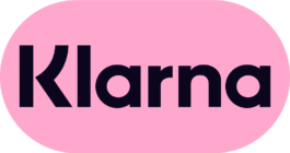Klarna logo featuring bold, black lowercase lettering in a modern sans-serif typeface against a soft pink oval background. Filippos Fragkogiannis